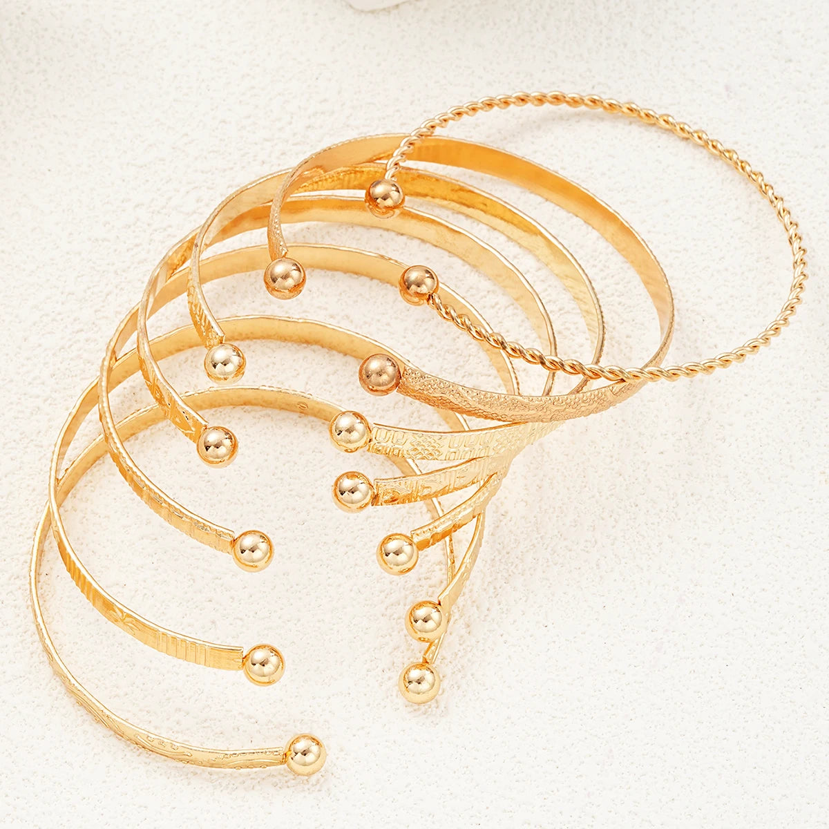 Gold Plated Bangles 7 pieces W2