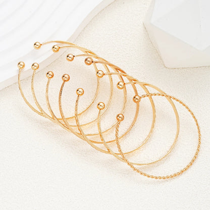 Gold Plated Bangles 7 pieces W2