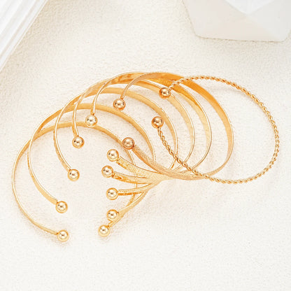 Gold Plated Bangles 7 pieces W2
